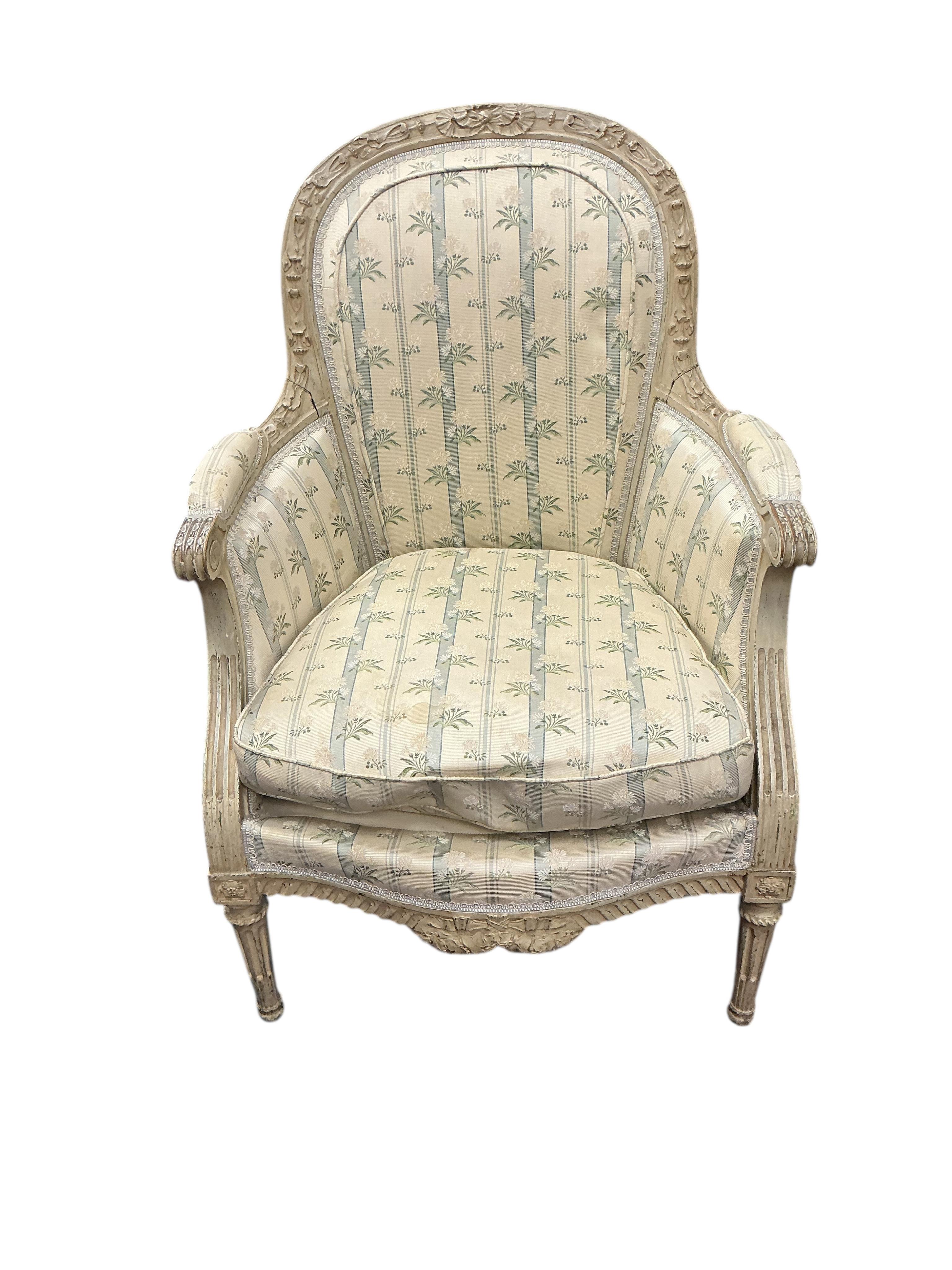 A Louis XVI style upholstered painted armchair, width 68cm, 54cm, height 98cm